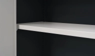 The shelf fits into Malow cabinets with a width of 1000 mm